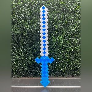 Pixelated Blue and White Toy Sword